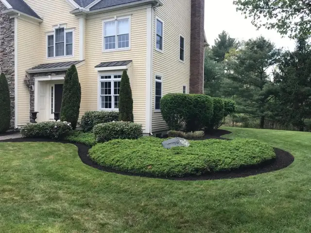 Landscaped bed in front of a home