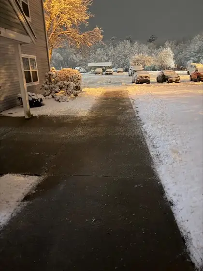 Plowed and cleared walkway at night